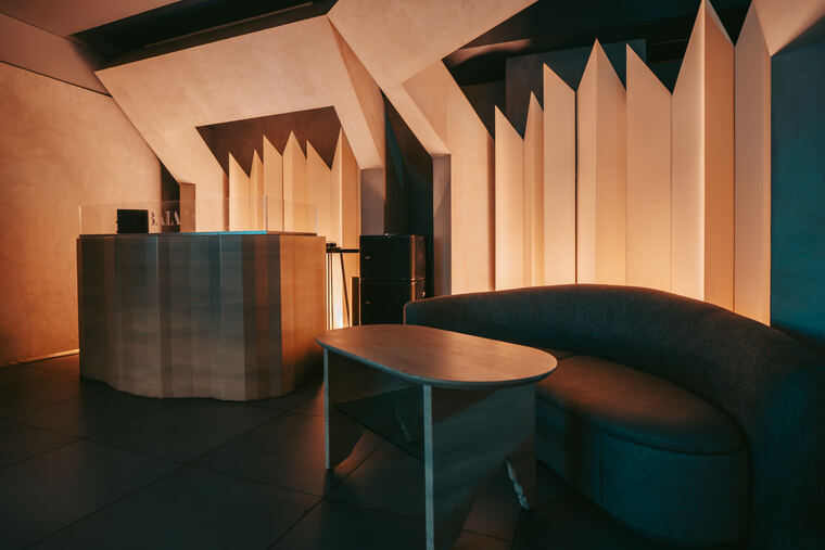 The bar and a curved booth