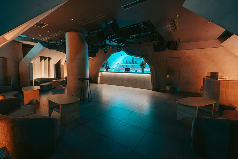 The floor and the bar beyond it